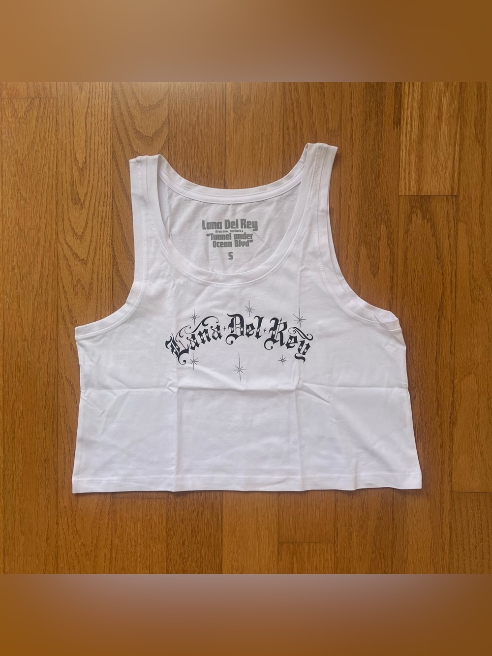 Lana Del Rey white with black cursive and stars low rider cropped tank